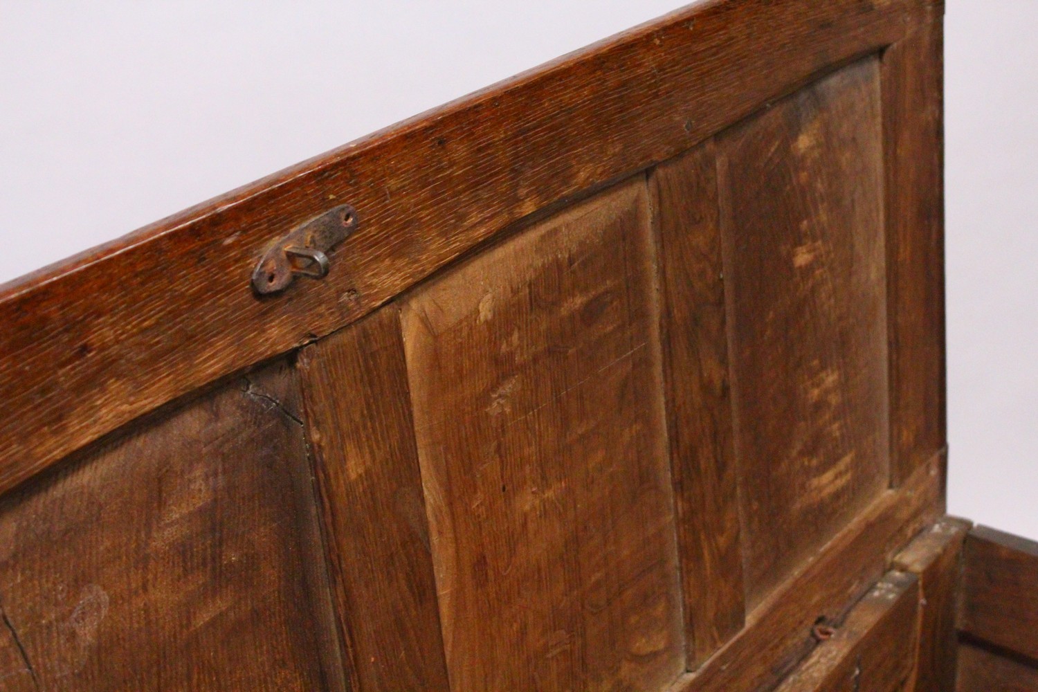 A 17TH CENTURY OAK COFFER, with a four panelled top, over a carved frieze and three carved panels, - Image 5 of 7