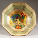 A MINTON OCTAGONAL FRUIT BOWL, decorated in many colours, the centre with a cockerel. 9.5ins