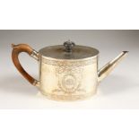 A GEORGE III ENGRAVED OVAL TEAPOT, with wooden knop and handle. London 1782. Maker: W.G. & C.a., not