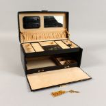 A GOOD LEATHER TRAVELLING JEWELLERY CASE.