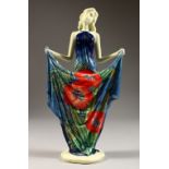 A FRENCH PORCELAIN FIGURE OF A LADY, in a dress decorated with poppies. 11ins high.
