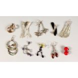 A BAG OF TEN VARIOUS SILVER EARRINGS.