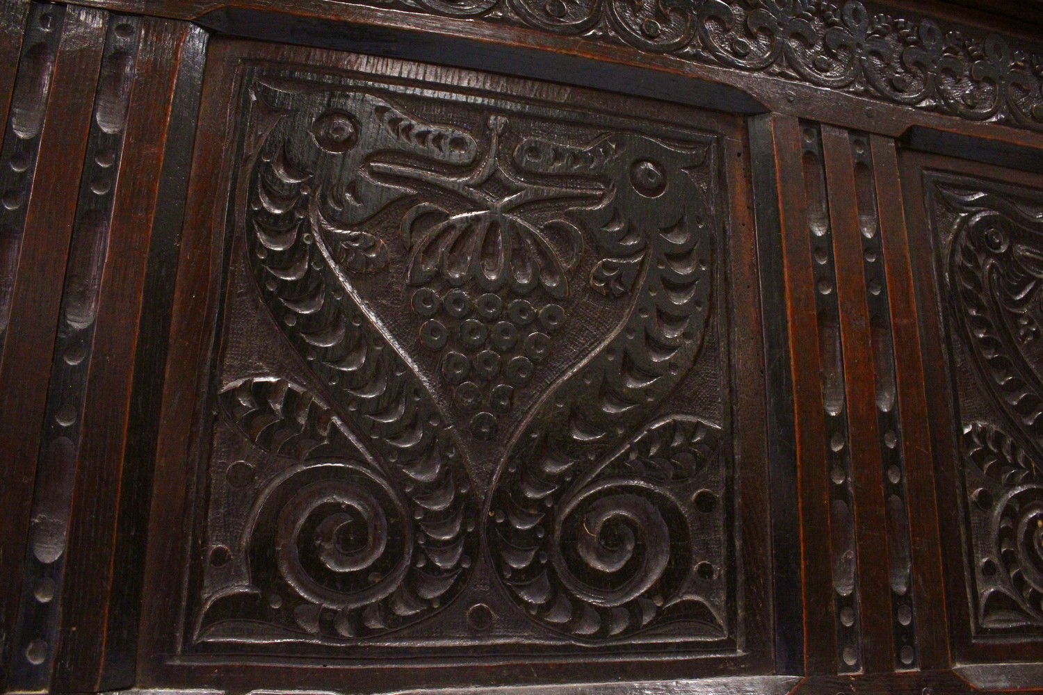 A 17TH CENTURY OAK COFFER, with a four panelled top, over a carved frieze and three carved panels, - Image 3 of 7