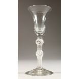 A GEORGIAN WINE GLASS, with two knops,air twist stem and inverted bell bowl. 6ins high.