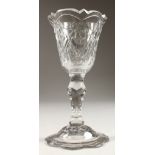 A LARGE GEORGIAN FACET CUT SWEETMEAT GLASS. 7ins high.