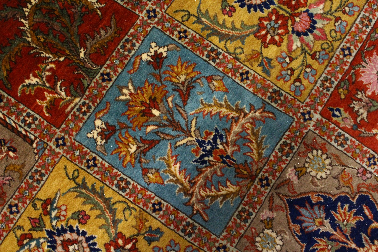 A VERY GOOD LARGE PERSIAN "GHOM" CARPET, the centre with seven rows of four floral motifs, varying - Image 7 of 10