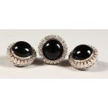 A VERY GOOD 18CT WHITE GOLD, ONYX AND DIAMOND RING AND EAR CLIPS.