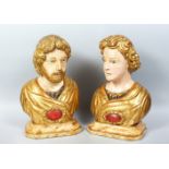 A GOOD PAIR OF 18TH CENTURY ITALIAN CARVED WOOD, PAINTED AND GILDED BUSTS. 16ins high.