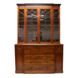 A GOOD GEORGE III MAHOGANY BREAKFRONT SECRETAIRE BOOKCASE, with a dentil and blind fret carved