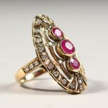 A GOOD 9CT GOLD THREE-STONE RUBY AND DIAMOND SET OVAL RING.