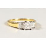 AN 18CT GOLD DIAMOND SET RING, set with twelve diamonds.