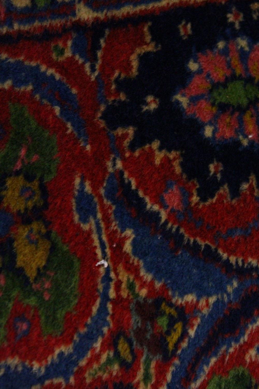 A PERSIAN CARPET, dark blue ground with central floral motif, within a similar border. 11ft 0ins x - Image 2 of 4