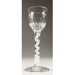 A GEORGIAN COTTON TWIST STEM WINE GLASS, with moulded bowl. 5.5ins high.