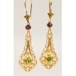 A PAIR OF SILVER AND GOLD PLATED, PERIDOT, AMETHYST AND DROP EARRINGS.
