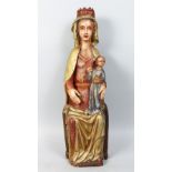 AN 18TH CENTURY ITALIAN CARVED WOOD AND PAINTED MADONNA AND CHILD. 24ins high.
