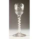 A GEORGIAN WINE GLASS, with cotton twist stem, the bowl engraved with flowers and leaves. 5.5ins