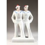 A DECO TYPE GROUP OF TWO SAILORS. 13ins high.