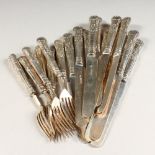 A SET OF TWELVE VICTORIAN KNIVES AND SEVEN FORKS. Sheffield 1856. Maker W. H.