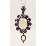 A 9CT GOLD AND SILVER, MOONSTONE, AMETHYST AND DIAMOND PENDANT AND CHAIN.
