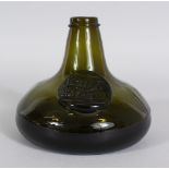 AN E.R. II 1947-1972 COLOURED WINE BOTTLE.