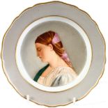 A 19TH CENTURY MEISSEN PLATE with portrait of a girl. Cross swords mark in blue. 7.5ins diameter.