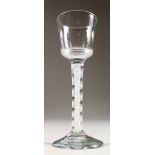 A GEORGIAN WINE GLASS, with cotton twist stem. 5.5ins high.