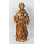 A 16TH-17TH CENTURY DUTCH CARVED WOOD STANDING SAINT. 20ins high.