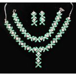 A GOOD EMERALD AND ZIRCON SUITE OF JEWELLERY, comprising NECKLACE, BRACELET AND EARRINGS.