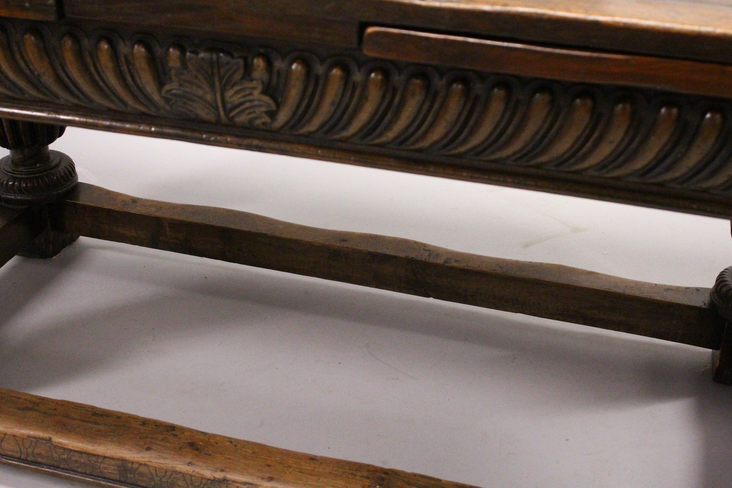 A GOOD 17TH/18TH CENTURY OAK DRAW LEAF TABLE, with a plain rectangular top, carved frieze on four - Image 8 of 9