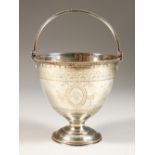 A GOOD VICTORIAN CIRCULAR PEDESTAL ENGRAVED SUGAR BASKET, with swivel beaded handle. London 1865.