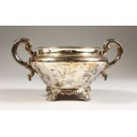 A WILLIAM IV TWO HANDLED SUGAR BASIN on four acanthus rounded feet. London 1835. Weight 10ozs.