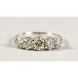 AN 18CT WHITE GOLD FIVE STONE DIAMOND RING of 1.1cts.