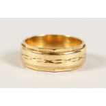 A 9CT GOLD WEDDING BAND, 8gms.