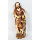 A 16TH-17TH CENTURY ITALIAN CARVED WOOD AND PAINTED SAINT with a lamb. 25ins high.
