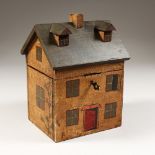 A PAINTED HOUSE TEA CADDY, the lid opens to reveal an interior. 9ins high.