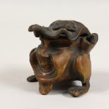 A BRONZE HEAVY INKWELL.