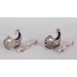 A GOOD PAIR OF HEAVY SILVER DOLPHIN SALTS AND SPOONS.