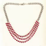 A GOOD 14CT WHITE GOLD TRIPLE ROW RUBY AND DIAMOND NECKLACE, total 16cts approx.