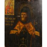 A RUSSIAN ICON. SAINT MITROFAN OF VORONEZH (1623-1703), on wood. See label on reverse. 15.5ins x