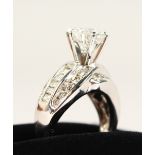 A VERY IMPRESSIVE 14CT WHITE GOLD DIAMOND RING, the centre stone of 2.2cts, total weight 3cts.