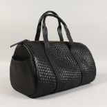 A RADLEY KIRKWOOD BLACK LEATHER WOVEN HANDBAG.