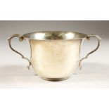 A PLAIN CIRCULAR TWO-HANDED SUGAR BASIN. 4ins diameter. London 1917. Maker: D. F. Weight 4ozs.