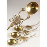 A SET OF FOUR VICTORIAN SILVER GILT SCORPION SPOONS. London 1893.