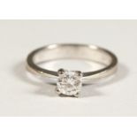 AN 18CT WHITE GOLD SINGLE STONE DIAMOND RING.