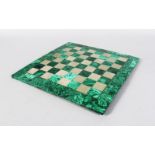 A GOOD ONYX CHESS BOARD. 36cms square.