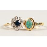 A 9CT GOLD OPAL RING and A CLUSTER RING.