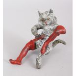 A SMALL COLD PAINTED CAT WITH RED BOOTS. 3ins high.