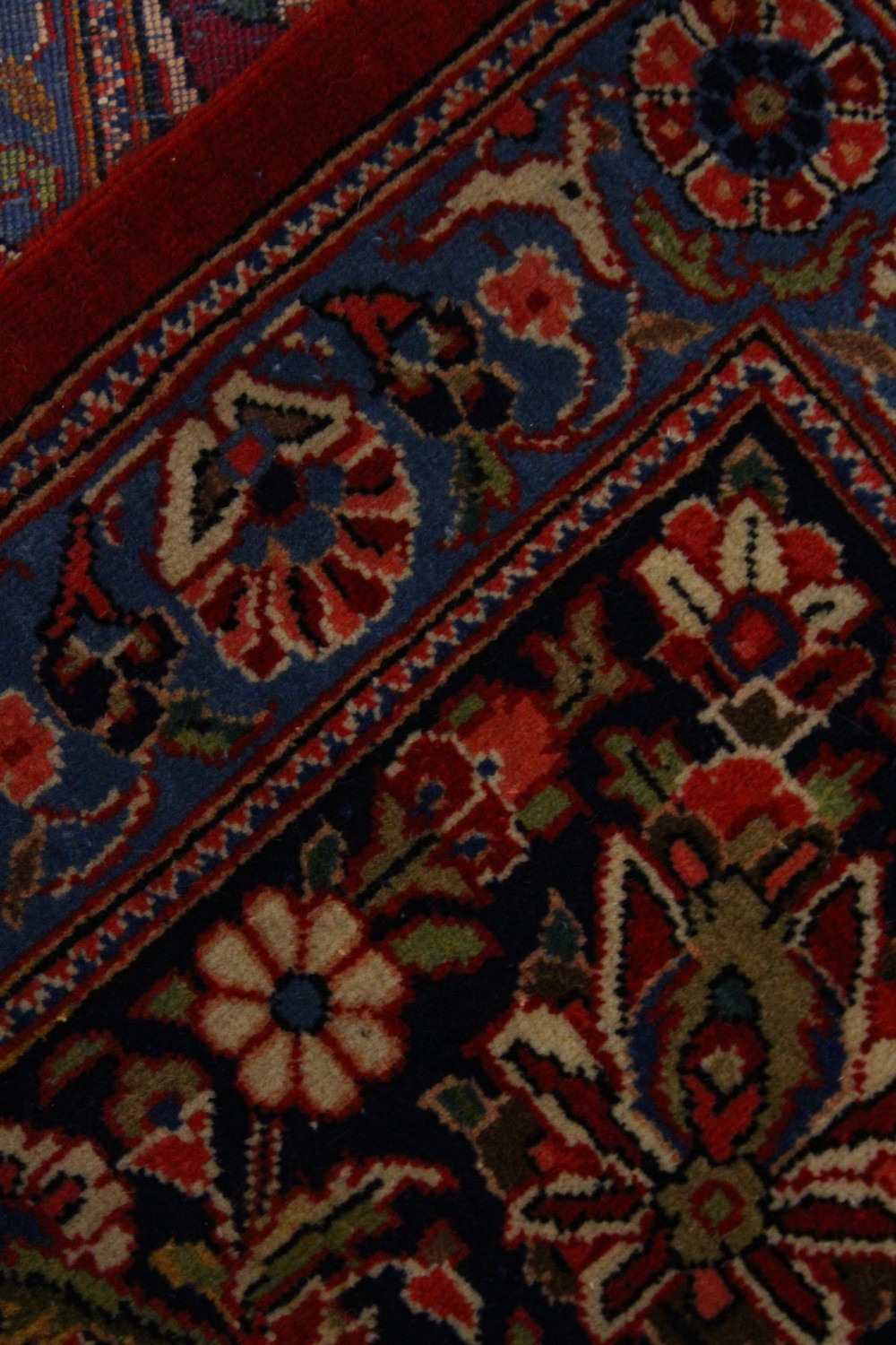 A GOOD PERSIAN CARPET, claret ground with stylised floral decoration, within a similar border. - Image 2 of 4