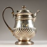 A GEORGE III WRYTHEN FLUTED JUG AND COVER. London 1815. Maker Alice and George Burrow. Weight
