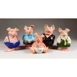 A SET OF FIVE WADE NATWEST BANK PIGGY BANKS.